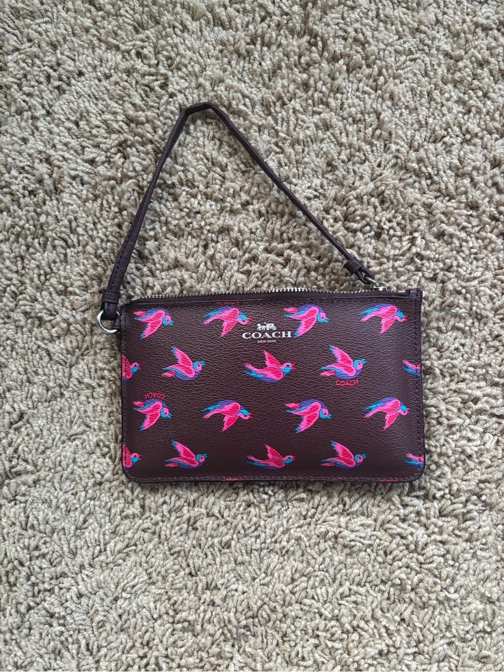 COACH Brown Wristlet with Pink & Blue Bird Motif